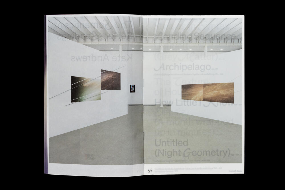 White gallery space with polished concrete floor displaying three framed artworks featuring landscape photographs, including one titled "Archipelago" and another "Untitled (Night Geometry)," with modern pendant lighting visible overhead.