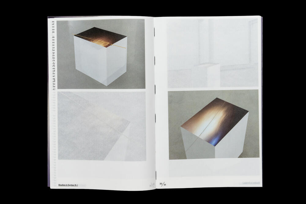Two pages from a catalog showing photographs of a white cubic sculpture with an illuminated opening on top. The left page displays the cube from above with a warm glow, while the right page shows a side view with cool blue and white lighting effects.