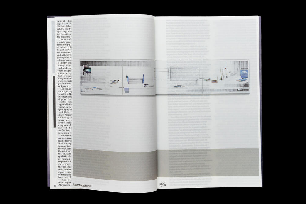 An open exhibition catalog spread displays minimalist interior design photographs and architectural renderings on the left page, with corresponding descriptive text and diagrams on the right page, featuring clean lines and a gray accent bar dividing the layout.